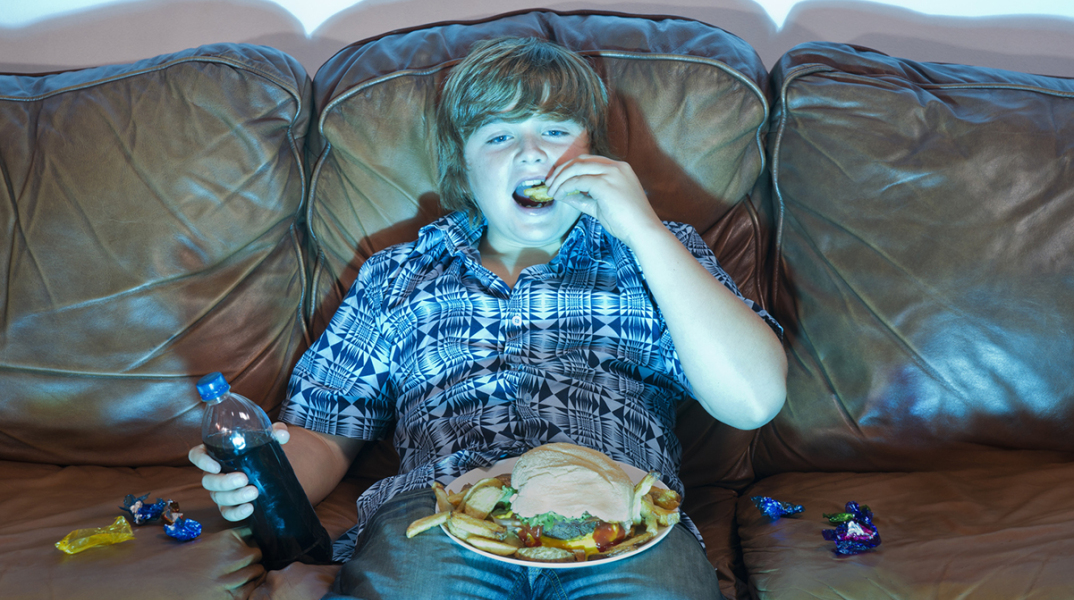 boy-watching-tv-eating-junk-food_1200px.jpg