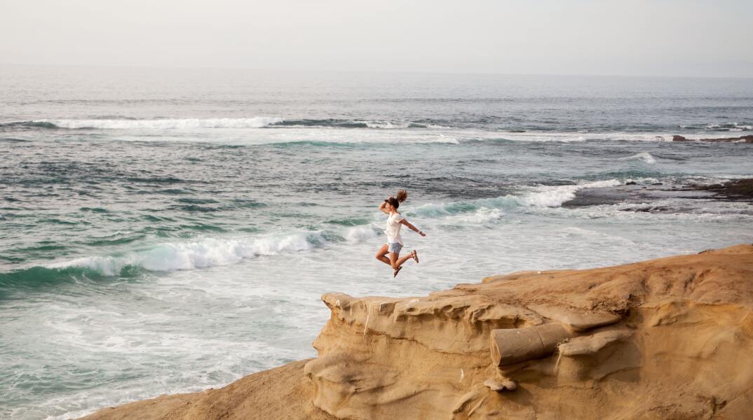 beach-girl-jumping-69102.jpg