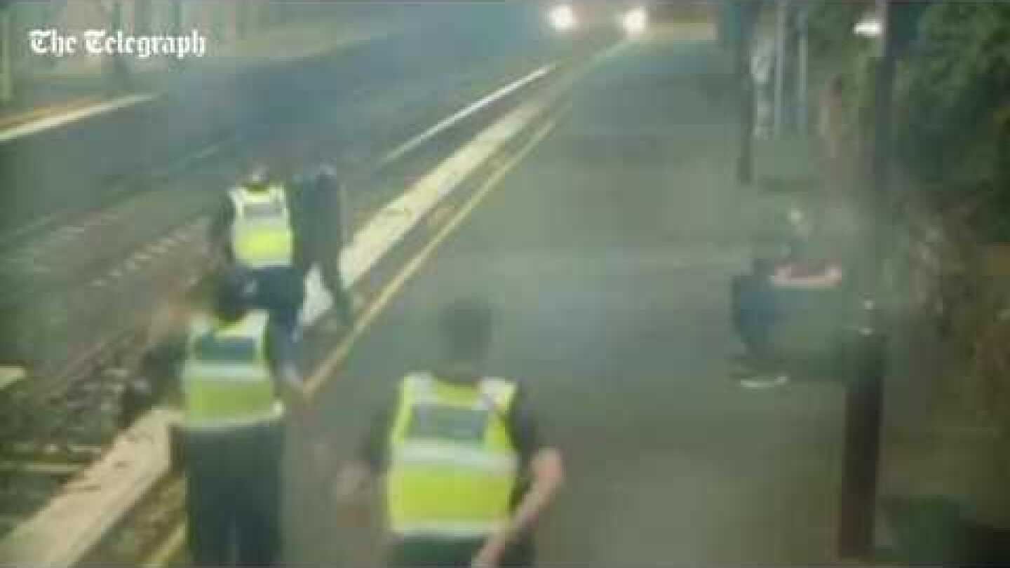 Narrow escape for woman walking on train tracks