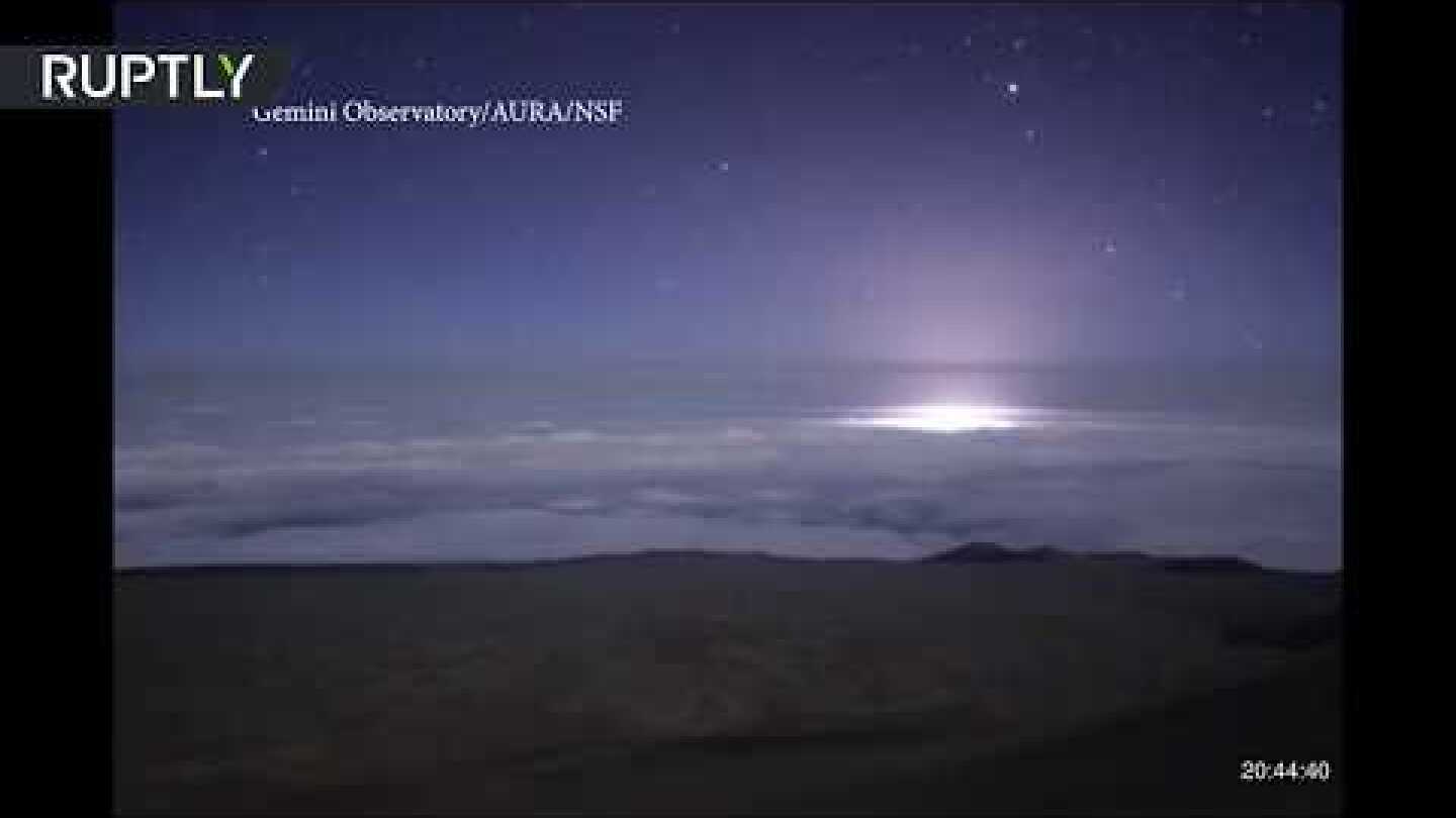 Night made day as Kilauea glows through clouds