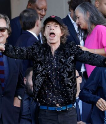 The Rolling Stones band members Mick Jagger (C) and Ronnie Wood (R) attend the Spanish LaLiga soccer match between FC Barcelona and Real Madrid, in Barcelona, Catalonia, Spain, 28 October 2023. EPA/Quique Garcia