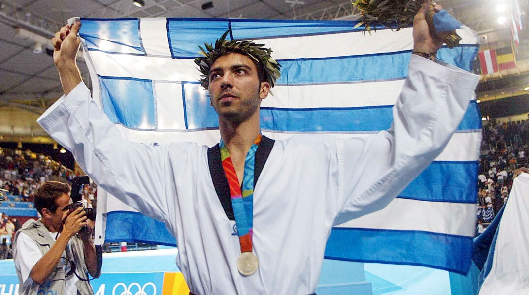 Ο Αλέξανδρος Νικολαΐδης με το ολυμπιακό μετάλλιο στο στήθος