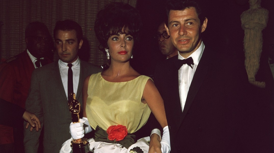 Η Ελίζαμπεθ Τέιλορ με τον τότε σύζυγό της, Έντι Φίσερ, στα Όσκαρ του 1961