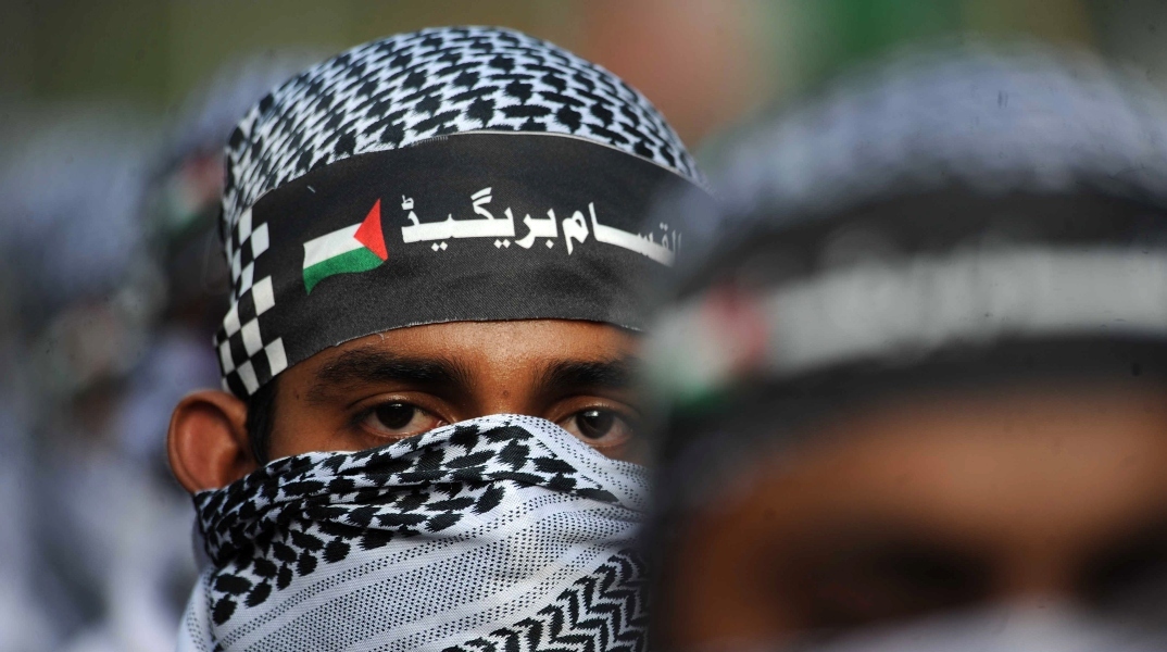 Υποστηρικτές του ισλαμικού πολιτικού κόμματος Jamat-e-Islami παρευρίσκονται σε συγκέντρωση αλληλεγγύης προς τον παλαιστινιακό λαό στο Καράτσι του Πακιστάν