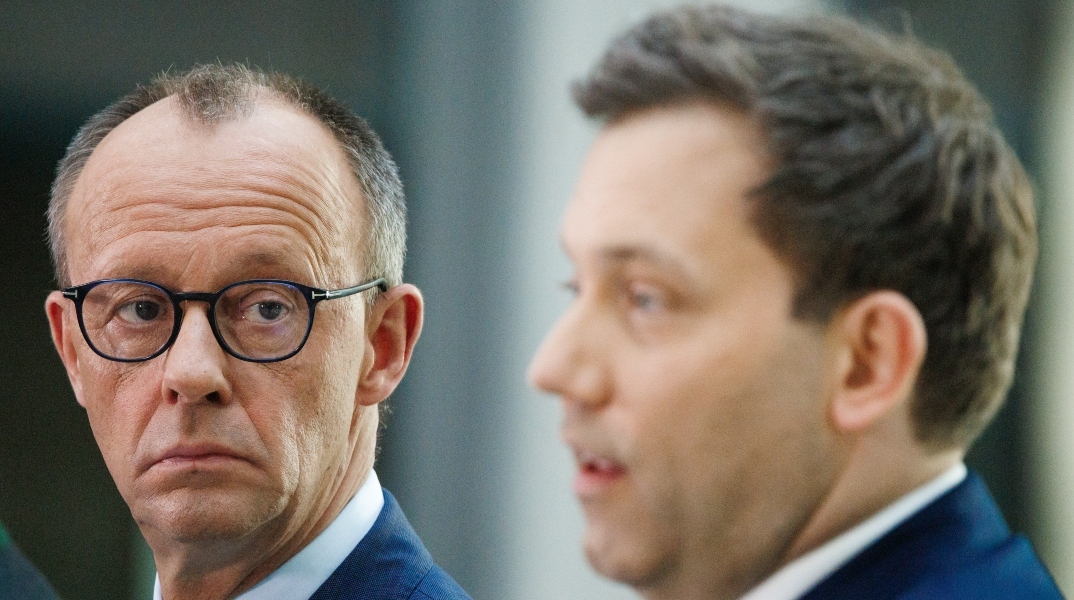 Ο πρόεδρος του CDU, Φρίντριχ Μερτς με τον ομόλογό του στο SPD, Λαρς Κλινγκμπάιλ