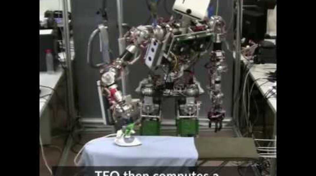 This robot will iron your clothes for you
