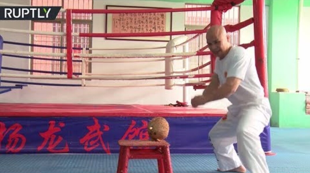 Unique Kung Fu: Master Li smashes nuts barehanded