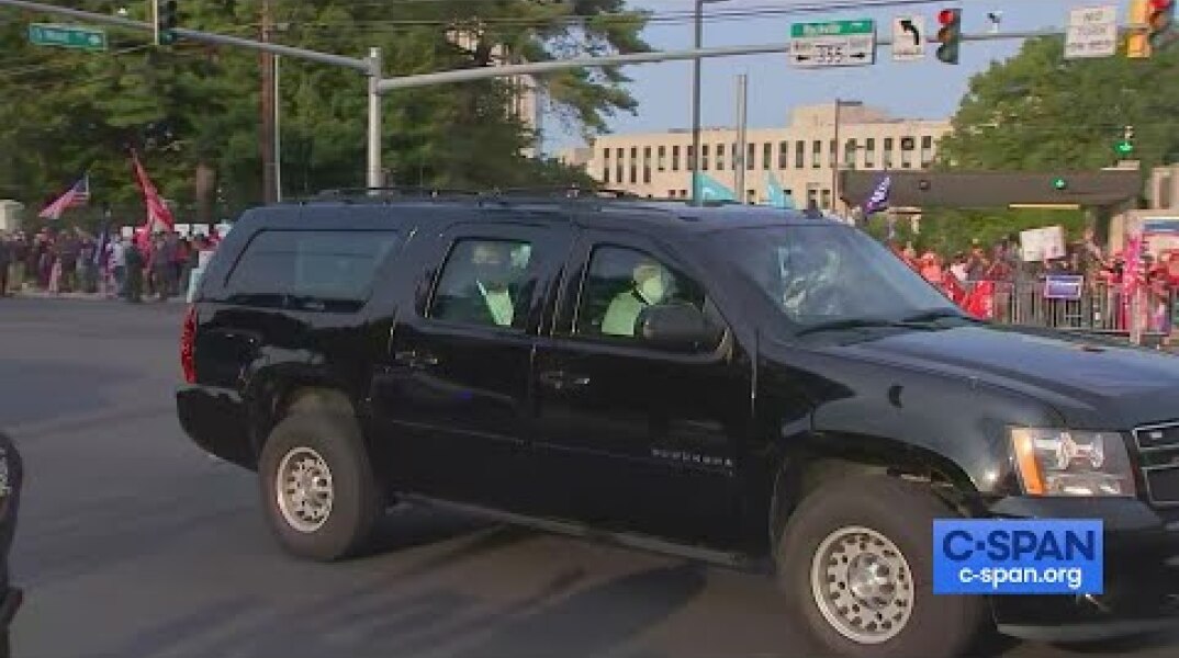 President Trump drives by supporters outside Walter Reed Medical Center.