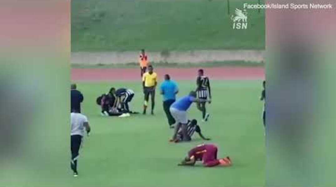 Video: Dramatic moment lightning appears to strike footballers during match