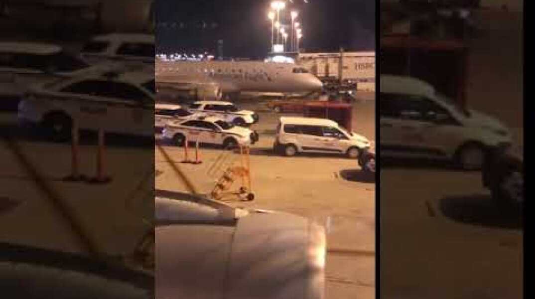 AMERICAN AIR FLIGHT EVACUATED AT MIAMI - BOMB THREAT (FOOTAGE)