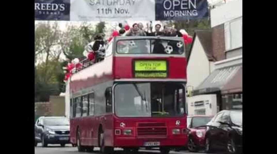 This lad was suprised with an open-top bus parade for winning his Football Manager League