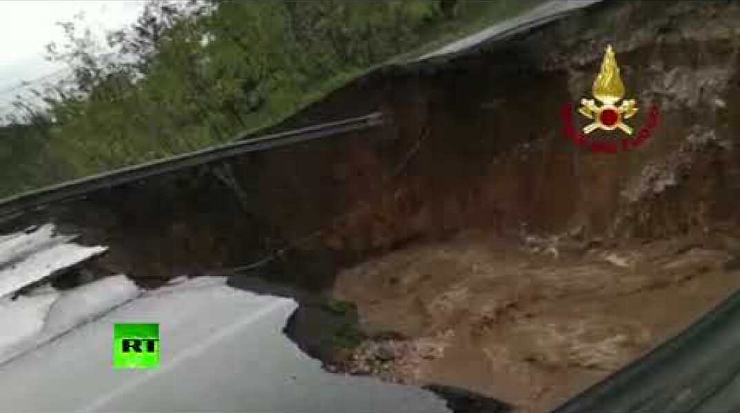 Huge sinkhole opens in Italian town after heavy rainfall, swallows car