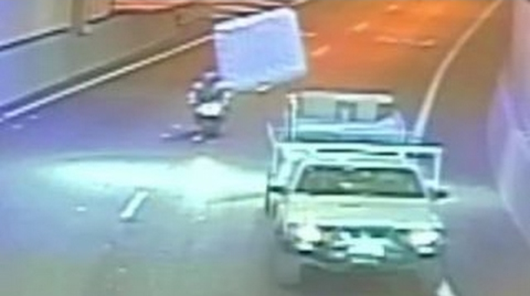 Flying mattress hits motorcyclist