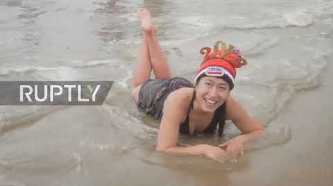 Dutch revellers begin the new year with ice cold swim