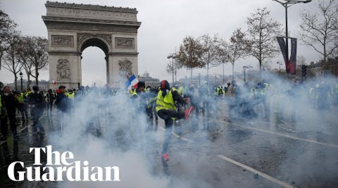 Police and protesters clash in Paris