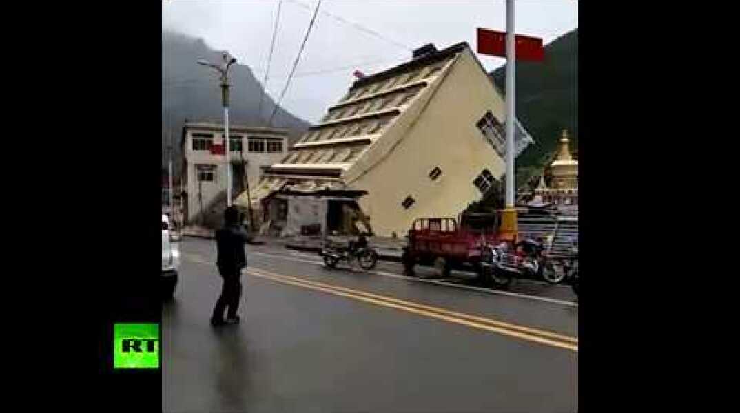 Caught on cam: Building collapses into river after heavy rains in Tibet