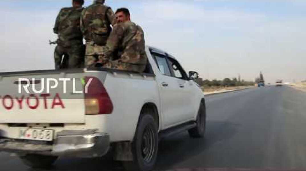 Syria: US troops and SAA cross paths on road between Manbij and Kobani *EXCLUSIVE*
