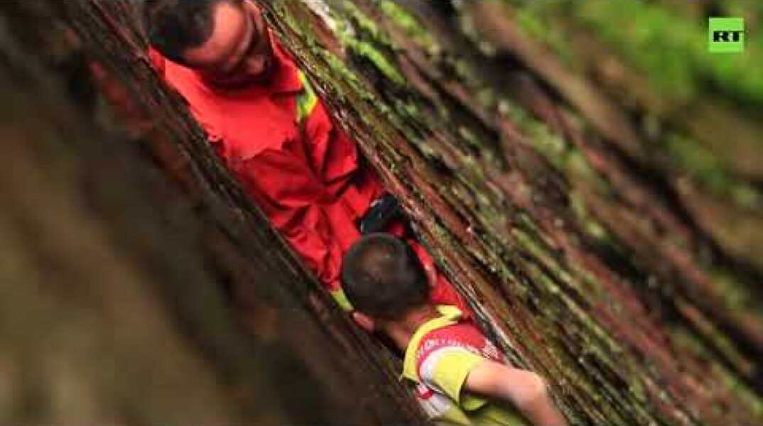 Boy stuck in tiny gap between walls rescued by Chinese firefighters