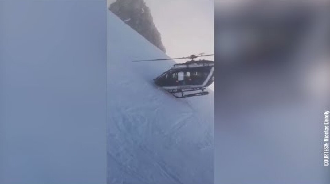 Dramatic helicopter rescue: Pilot flies within inches of mountainside to rescue French skier