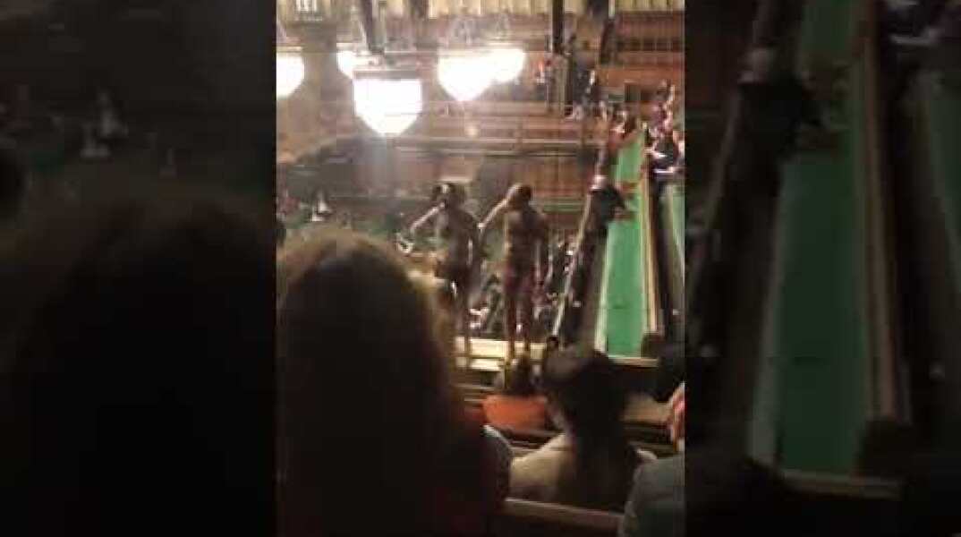 Protestors strip naked in the House of Commons during Brexit debate