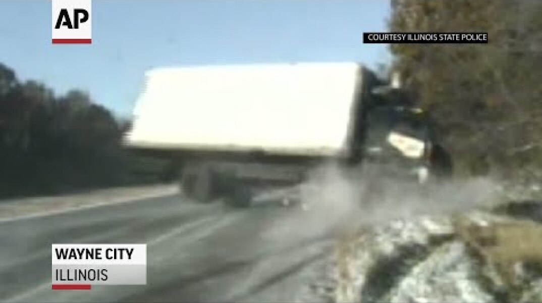 Dash camera shows close call on icy Illinois road