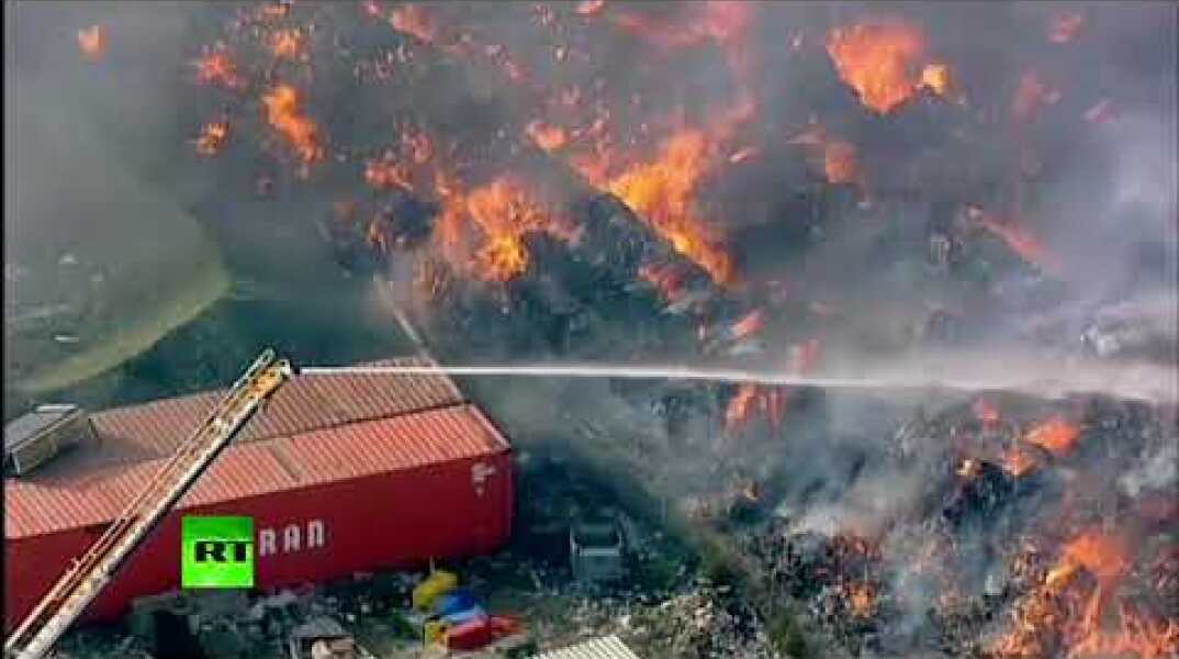More than 100 homes evacuated due to massive fire at paper recycling plant