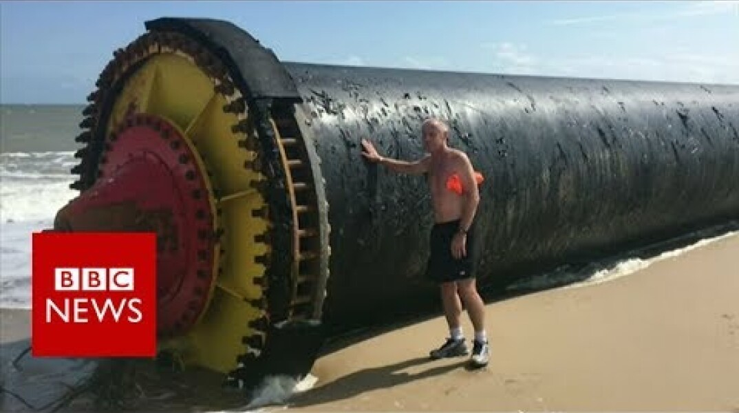 Giant pipes wash up on beaches - BBC News