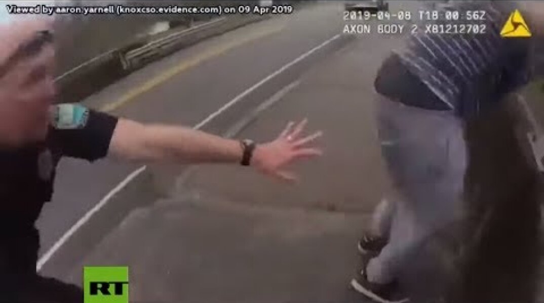 Police officer saves the life of a young man that attempted to jump off a bridge in Knox County