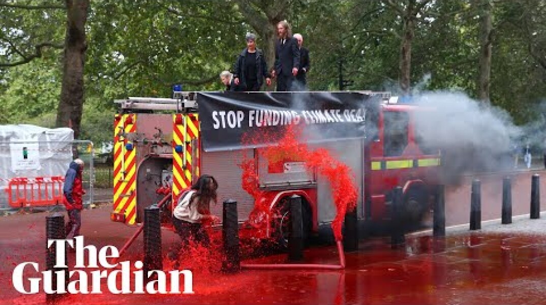 Fake blood sprayed on Treasury in Extinction Rebellion protest