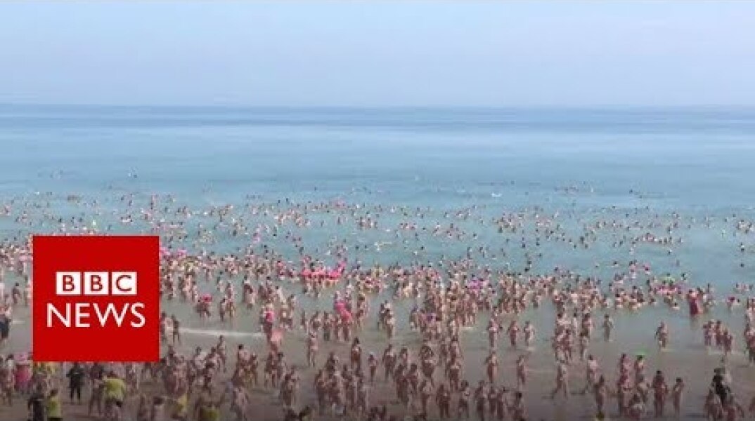 World record set for largest skinny dip - BBC News
