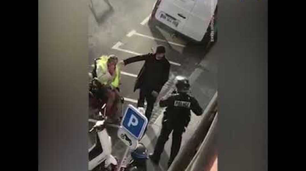French police forces pepper spray a man in a wheelchair