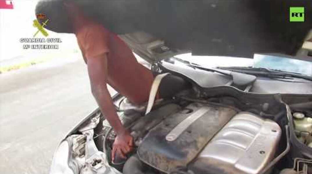 Spanish police find migrants hidden in car trunk & behind dashboard