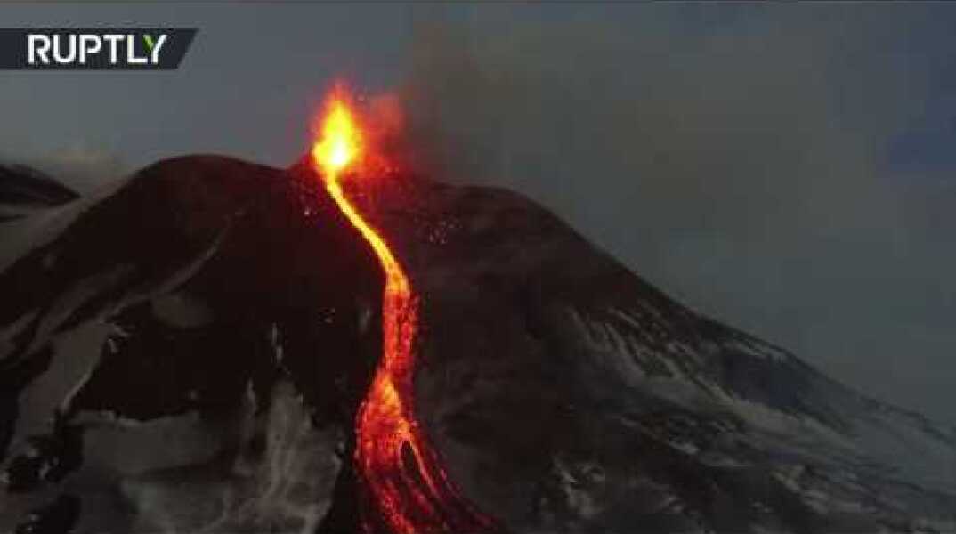 Eruption fly-over: Mount Etna spewing lava & smoke, captured from drone