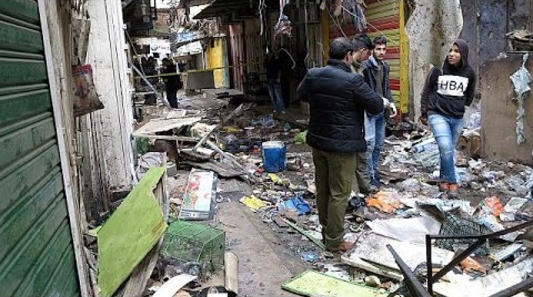 Deadly double bombing at Baghdad market