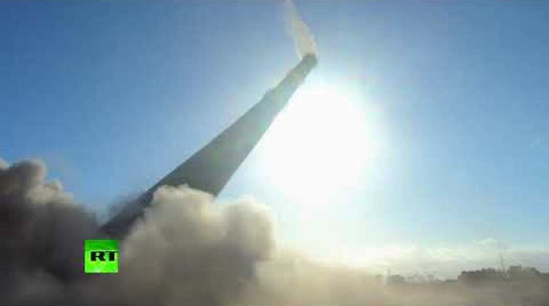 200-meter power station chimney destroyed in controlled demolition