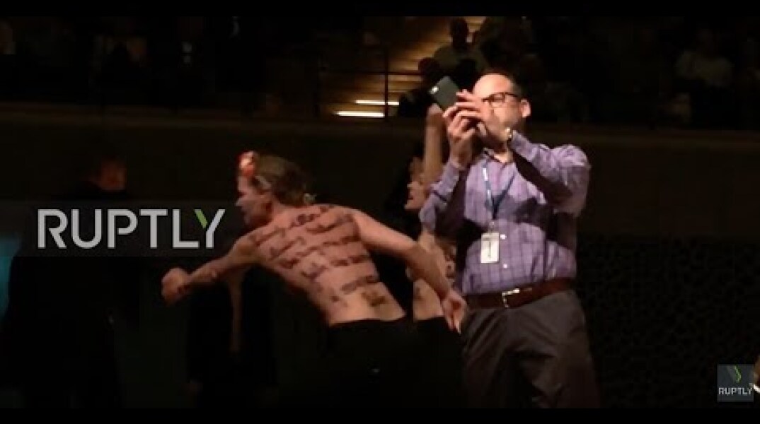 Germany: Topless FEMEN activists crash Woody Allen concert in Hamburg *EXPLICIT*