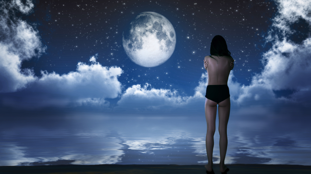 girl-standing-in-front-of-new-moon.jpg