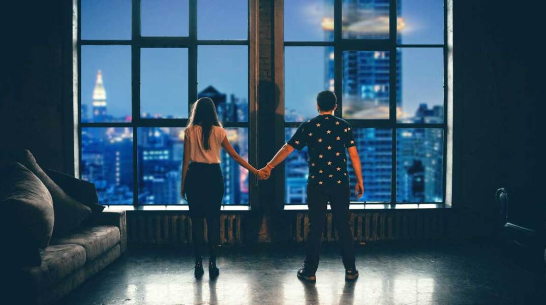 man and woman holding hands