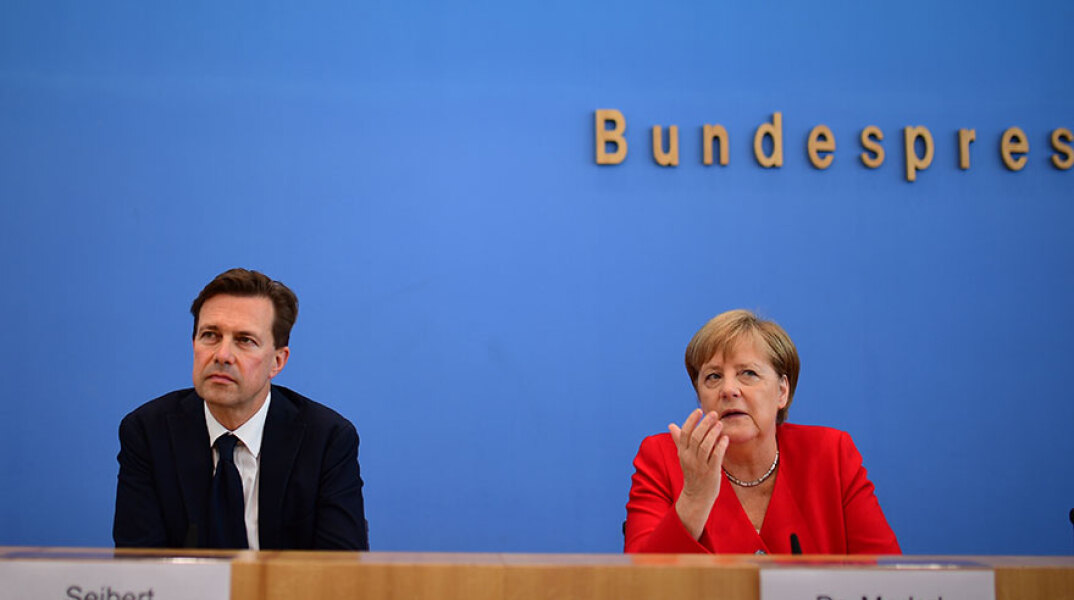 Στέφεν Ζάιμπερτ - Άνγκελα Μέρκελ