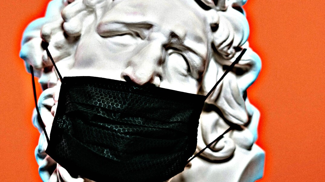 white-ceramic-sculpture-with-black-face-mask-.jpg