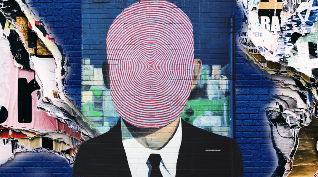Γκράφιτι που απεικονίζει άνθρωπο με δακτυλικό αποτύπωμα αντί για κεφάλι