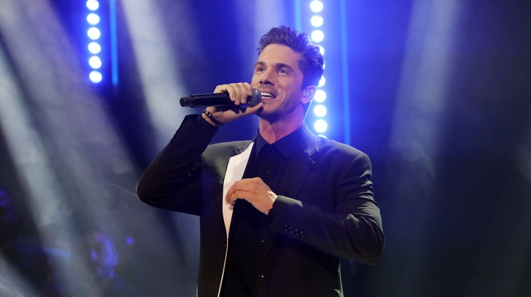 Ο τραγουδιστής, Νίκος Οικονομόπουλος