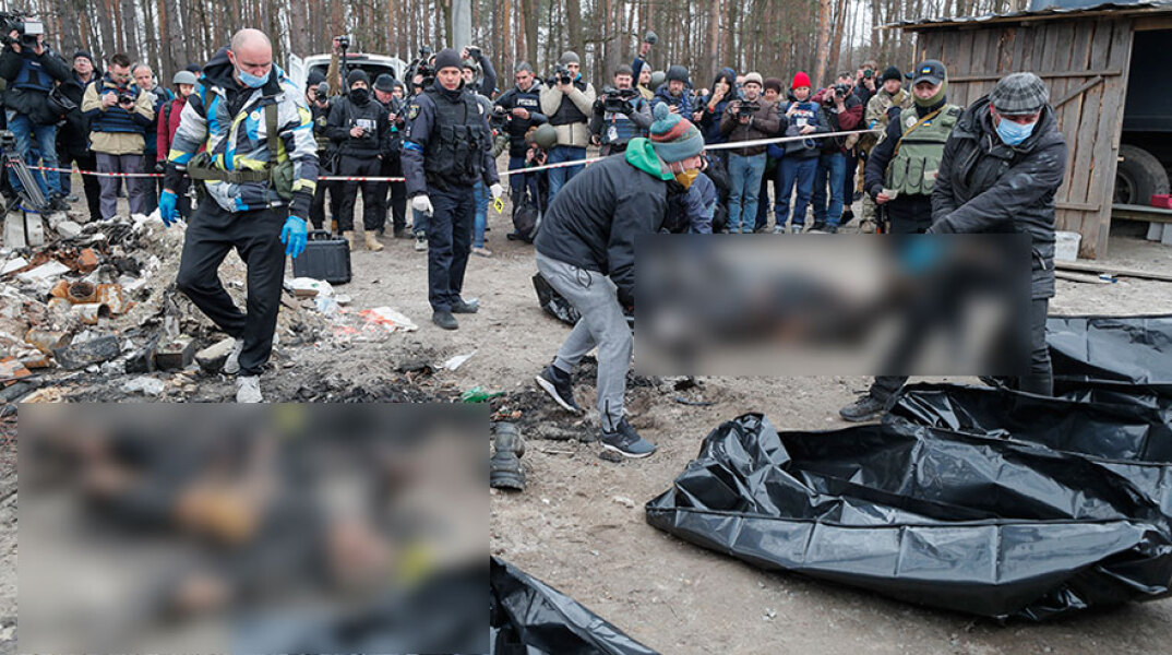 Στην Μπούχα της Ουκρανίας απανθρακωμένα πτώματα αμάχων τοποθετούνται σε μαύρες σακούλες