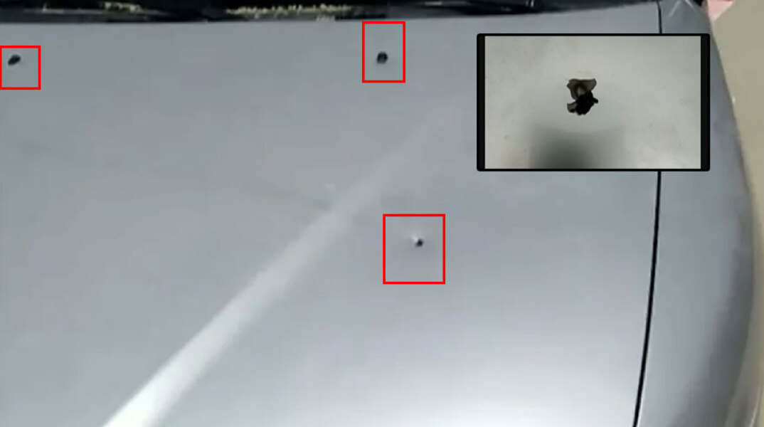 Οι τρύπες από τις σφαίρες σε αυτοκίνητο στην Ερέτρια, μέσα στο οποίο επέβαιναν παιδιά