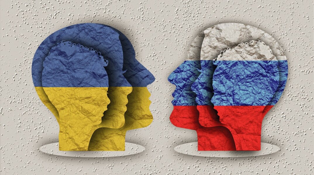 Γραφικό που απεικονίζει ανθρώπινα πρόσωπα με τα εθνικά χρώματα της Ουκρανίας και της Ρωσίας