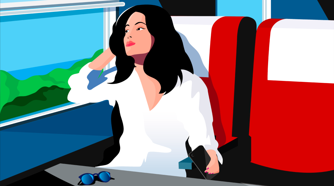 mixkit-woman-staring-out-the-window-of-a-moving-train-60-desktop-wallpaper.png