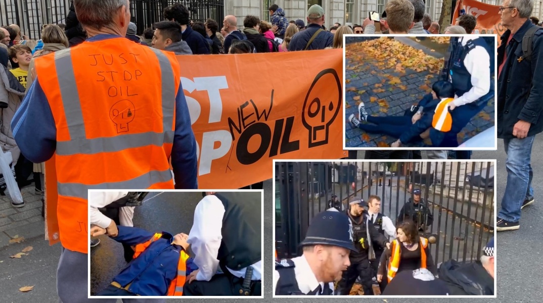 Ακτιβιστές της περιβαλλοντικής οργάνωσης Just Stop Oil επιχείρησαν να περάσουν από τις πύλες της Ντάουνινγκ Στριτ - Τους απομάκρυναν ένοπλοι αστυνομικοί.