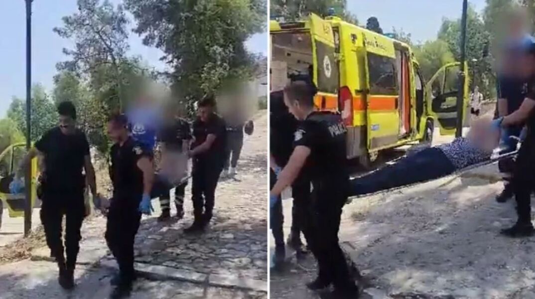 Αστυνομικοί πήραν με φορείο τουρίστρια που κατέρρευσε από τον καύσωνα στην Ακρόπολη