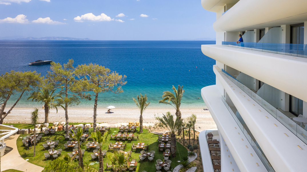 isla-brown-corinthia-drone-day-view-girl-on-balcony