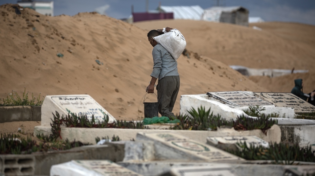 Battles rage around Rafah after U.S. halts some weapons to Israel